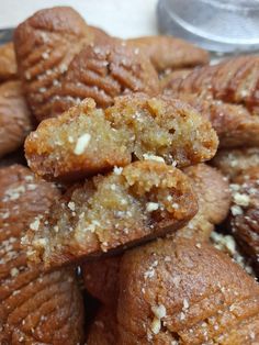 a pile of pastries sitting on top of a table