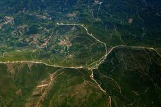 an aerial view of the mountains and valleys