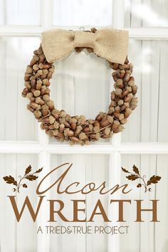 a wreath is hanging on the front door with words across it that read, acorn wreath a tried - true project