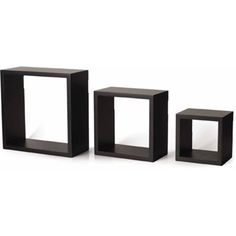 three black cubes sitting next to each other