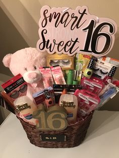 a teddy bear sitting next to a sign that says smart sweet 16 and it's surrounded by various items