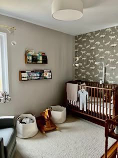 a baby's room is decorated in neutral colors