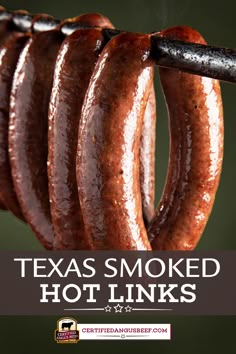 some hot dogs hanging from a line with the words texas smoked hot links