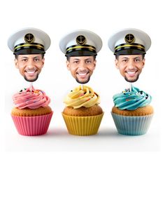 three cupcakes with captain's hats on them are in front of a white background