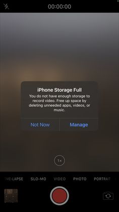 an iphone screen showing the settings for storage full and not now manage file size options