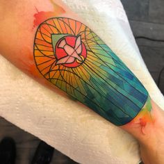 a person with a colorful tattoo on their arm