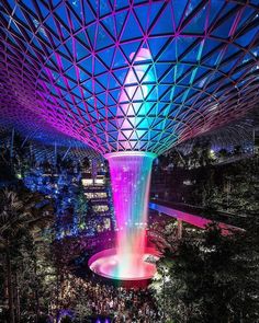 the inside of a building with colorful lights