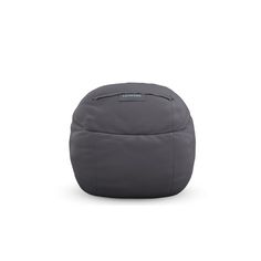 a grey bean bag sitting on top of a white floor