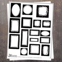 some black and white paper with different shapes on it's side, including square frames