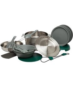 an assortment of cooking utensils and pans