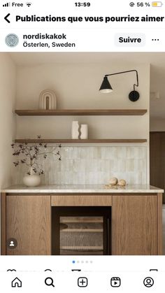 an image of a kitchen with wooden cabinets and white tile backsplashes on the wall