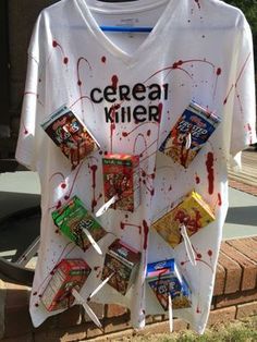 a t - shirt that has been decorated with candy bars and cereal boxes on it