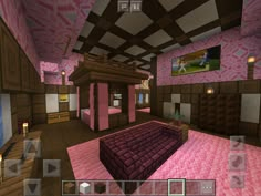 a room with pink walls and furniture in the center, including a purple carpeted bed