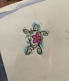 a drawing of a turtle with a pink flower on it's head and an intricate design