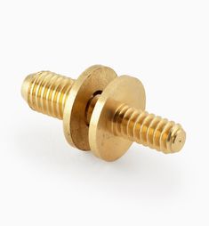 an image of brass screws on white background