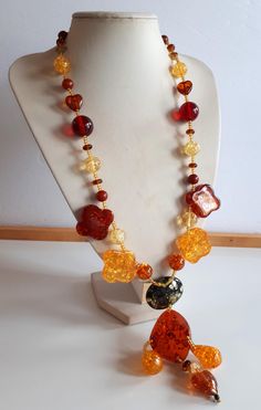 Statement bold Vintage yellow red orange cognac lucite plastic with inclusions station pendant necklace with huge beads . Good vintage  condition - sold as is - return not accepted.  To make this a smooth and pleasant transaction experience for everyone, all buyers need to read and understand the description, the terms of sale , the payment and the shipping indicated in this listing. Return not accepted - please ask before purchase. Vintage Yellow, Cognac, Beaded Necklace, Jewelry Necklaces, Accessory Gift, Electronic Accessories, Pendant Necklace, Purses And Bags, Beads