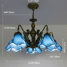 a chandelier with three blue lamps hanging from it's sides and measurements