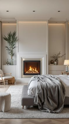 Bedroom with Fireplace Fireplace Between Bedroom And Bathroom, Primary Bedroom Fireplace Wall, Bedroom Fireplace Seating Area, Gas Fireplace In Bedroom Master Suite, Modern Fireplace In Bedroom, Modern Bedroom With Fireplace, Built In Electric Fireplace Bedroom, Diy Fireplace In Bedroom, Primary Bedroom Fireplace Ideas