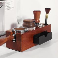 a coffee maker and some other items on a table