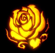 a pumpkin carved to look like a rose