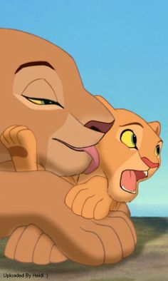 the lion and cub are hugging each other in this animated scene from disney's the lion king