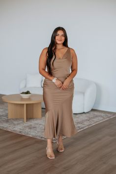 Details: Jordanne Satin Dress Cowl Neckline Scoop Open Back Back Tie Detailing Asymmetrical Hem Detailing Satin Material Interior Lining No Stretch Midi-Maxi Length Available in Taupe Material: Self: 95% Polyester and 5% Spandex Lining: 100% Polyester Measurements: Small - Bust: 34" | Length: 54" Medium - Bust: 36" | Length: 54.5" Large - Bust: 38" | Length: 55" Athleisure Shorts, Back Back, Boutique Dress, Cowl Neckline, Satin Material, Satin Dress, Large Bust, Asymmetrical Hem, Top Sales