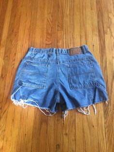 This is a great vintage pair of denim jean shorts that are ready to make you look and feel perfect. If you want some shorts that are useful and different, make these yours. They have no rips, holes, stains or smells. Measurements: laying flat and doubled Waist: 31 inches Hips: 23 inches Rise: 12 inches Inseam: 3 1/2 inches Length: 14 inches Size on tag: 11 Retro Denim Jean Shorts With Built-in Shorts, Retro Short Denim Shorts, Retro Denim Blue Jean Shorts, 90s Style Cotton Jean Shorts With Pockets, Retro Medium Wash High-waisted Jean Shorts, Retro High-waisted Jean Shorts In Medium Wash, Retro High Rise Denim Jean Shorts, Light Wash Vintage Denim Shorts, Retro High-rise Denim Jean Shorts