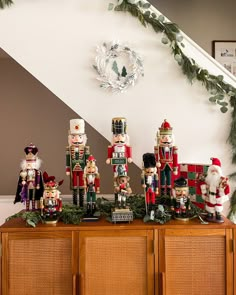 nutcracker figurines on display in front of christmas decorations