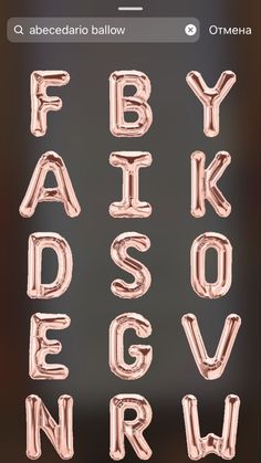 the alphabet is made out of pink foil balloons