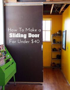 a sliding door with the words how to make a sliding door for under $ 40