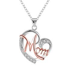 [Ad] The Washranp Necklace Chain is a stylish and meaningful piece of jewelry that is perfect for Mother's Day or as a gift for any special occasion. The necklace features a delicate chain with a stunning English letter "Mom" pendant adorned with a hollow heart design. This elegant necklace is designed for women and girls, making it a perfect accessory for any age group. The necklace is not only a beautiful fashion accessory, but it also carries a heartfelt message of love and appreciation for #womennecklace Necklace Chain Types, Sterling Silver Heart Necklace, Detailed Necklace, Mors Dag, Heart Shaped Diamond, Silver Heart Necklace, Mom Necklace, Crystal Necklace Pendant, Copper Plated