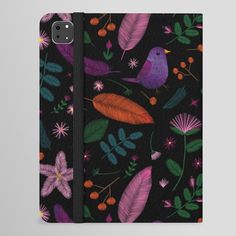 a black phone case with colorful flowers and birds on it