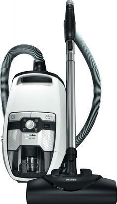 a white and black vacuum cleaner on a white background