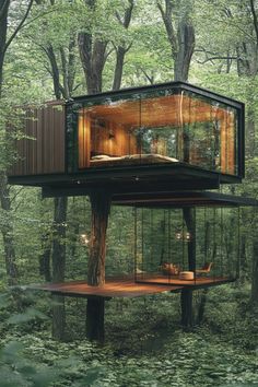 a tree house in the woods surrounded by trees