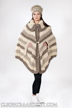 A winter poncho made of pure undyed wool. It is voluminous, heavy and really really warm! Cozy Alpaca Poncho For Winter, Cozy Alpaca Cape For Winter, Bohemian Knitted Cape Poncho, Winter Alpaca Cape Poncho, Winter Alpaca Poncho Cape, Brown Alpaca Winter Cape, Oversized Knitted Winter Cape, Beige Bohemian Winter Cape, Cozy Wool Poncho Cape