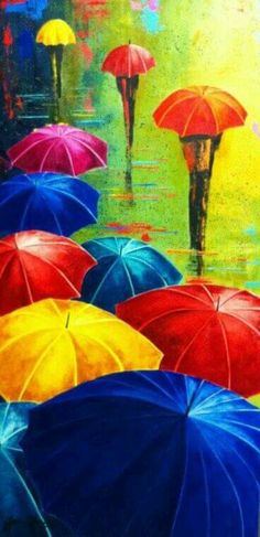 there are many colorful umbrellas in the rain