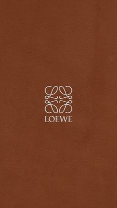 a brown leather book with the word loewe on it