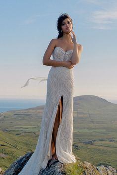 Sexy fitted with a sweetheart neckline incredible beaded lace and high slit brings all glam | wedding, bridal inspo, wedding dress ideas, wedding gown inspo, 2024 wedding, luxury wedding dress, designer wedding dress, lace wedding dress, dream wedding dress, wedding dresses romantic, engaged, elegant wedding dress, spring wedding, spring wedding dress, 2024 bride, lace wedding gown, sparkly wedding dress, wedding photography, wedding photo ideas, sleek dress, sexy wedding dress #wedding #bride Ethereal Wedding Dresses, Aurora Wedding, Strapless Wedding Dresses, Strapless Wedding Gown, Country Bride, Open Backs, Boho Wedding Dresses, Ethereal Wedding, Affordable Wedding Dresses