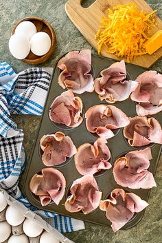 the muffins are ready to be baked in the oven with cheese and other ingredients