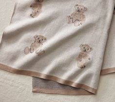 two towels with brown teddy bears on them