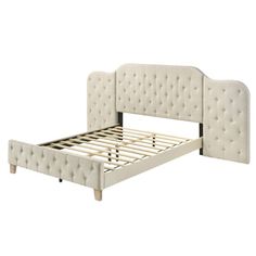 a white bed frame with buttons on the headboard and foot board is shown in front of a white background