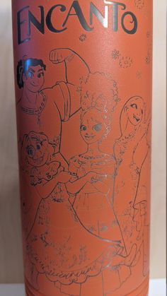 an orange can with the words encanto on it and pictures of children around it