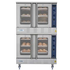 three ovens that have food inside of them