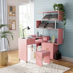 a pink desk and chair in a room