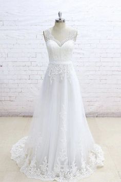 a - line / princess v - neck tulle appliques sweep train wedding dress