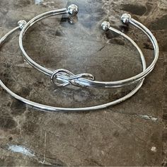 This Is A Set Of 2 Fashion Jewelry Bracelets Silver Tone One Is Plain Silver And One Has The Infinity Symbol Please Contact Me With Any Questions Cuff Bracelets Silver, Bracelets Silver, Ar Accessories, Jewelry Bracelets Silver, Infinity Symbol, The Infinity, Silver Cuff Bracelet, Blush Makeup, Rain And Snow Boots