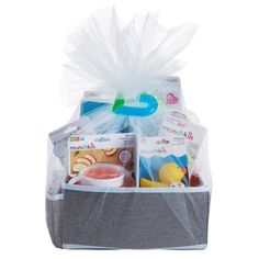 a gray and white basket filled with baby items