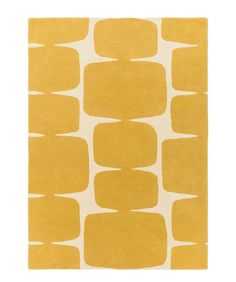 an area rug with yellow and white squares in the middle, on a white background