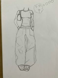 a drawing of a woman's top and pants with a thought bubble above her head