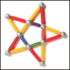 a star made out of colored pencils and balls